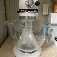 NEW Kitchenaid color, Frosted Pearl and comes with a clear glass bowl, LOVE  IT. Hope its available when we finall…