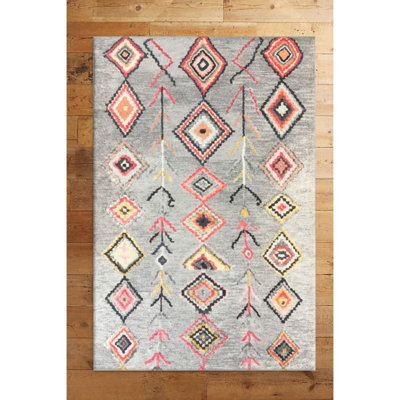 Tapis gris / rouge / orange en polypropylène tissé à la machine Edonis