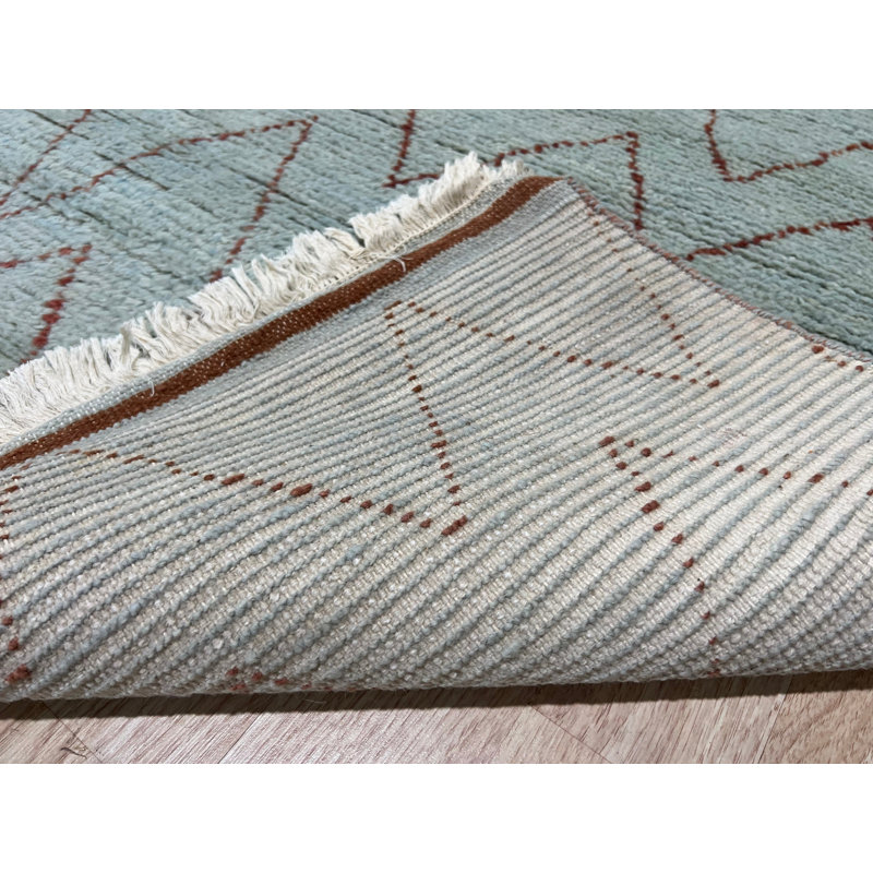 Tapis marocain bleu clair en laine noué à la main