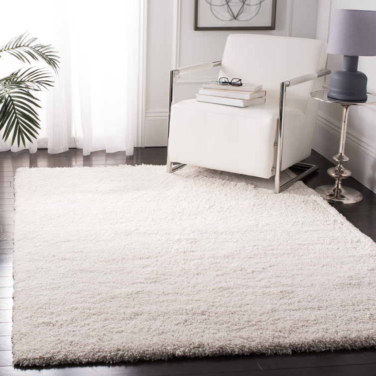 Solid Colour Machine Woven Polypropylene Area Rug in Cream