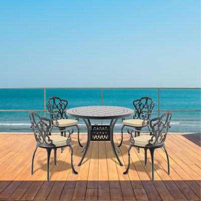 5-Piece Set Of Cast Aluminum Patio Furniture With Black Frame And Off-White Seat Cushions