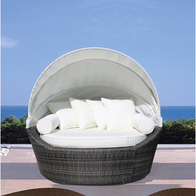 Carrasco 65'' Wide Wicker Patio Daybed with Cushions