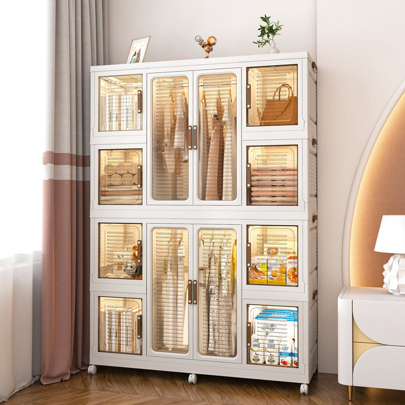 Grande armoire de rangement portative avec 8 petites armoires de rangement et 2 tringles de suspension pour les articles. 12, tringles, portes magnétiques. Pour les vêtements, les articles. Pp et abdos forts Rapide à assembler. Blanc