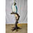 Giant Parrot Standing on a Tree Statue