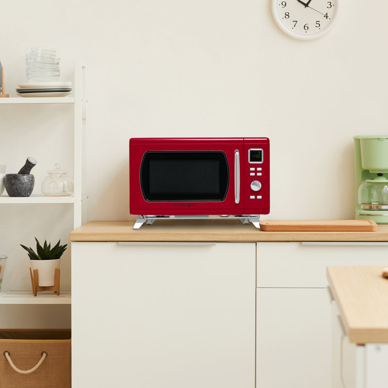 Nostalgia 0.9 Cubic Feet Countertop Microwave, Red