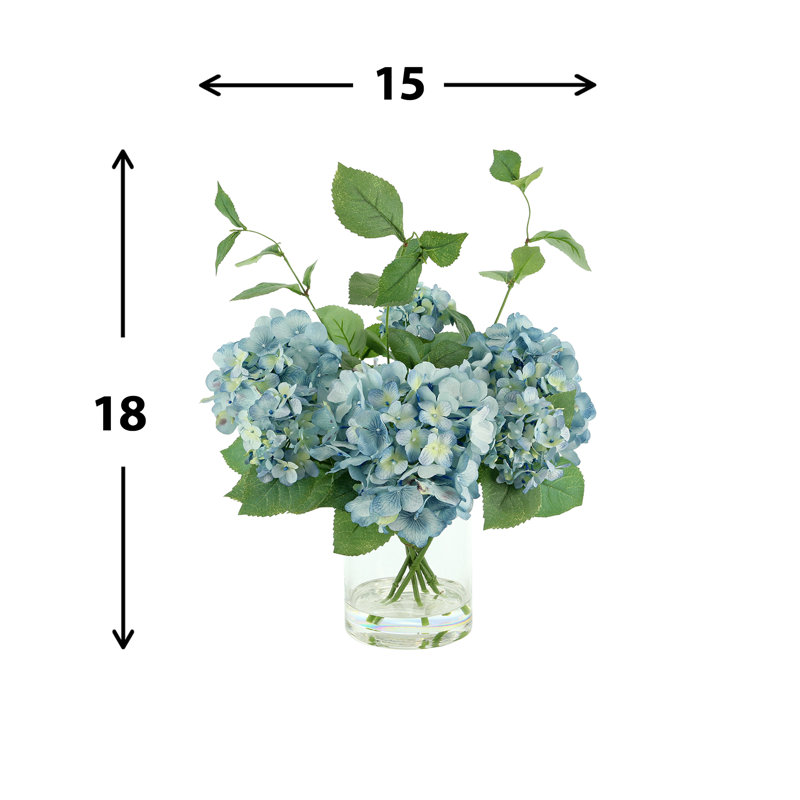 Hydrangea Arrangement In A Clear Glass Vase