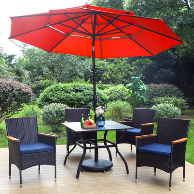 Leonard 4 - Person Patio Dining Set with Square Table , Cushions Included