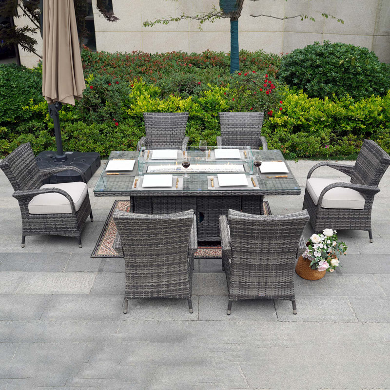Ardala 6 - Person Wicker Patio Dining Set with Rectangular Table , Cushions Included, Gray