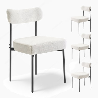 Ensemble de 4 chaises de salle à manger Boucle avec dossier incurvé et pieds en métal robustes pour un confort et un style modernes.