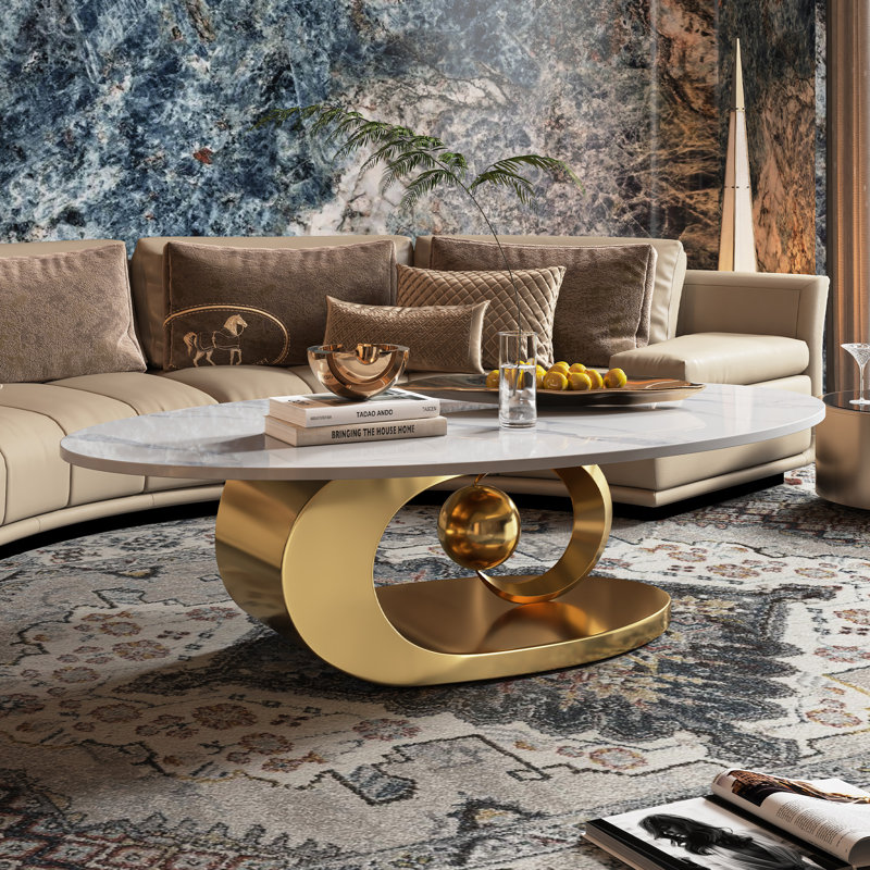 49.2" Oval Coffee Table with Faux Marble Top, Gold Stainless Steel Base with Abstract Fantastic Midsize Sphere Crescent-Shaped Design