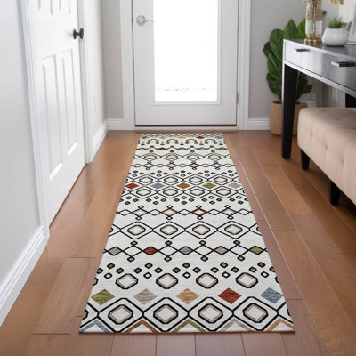 Tapis rectangulaire Aleighna avec envers antidérapant