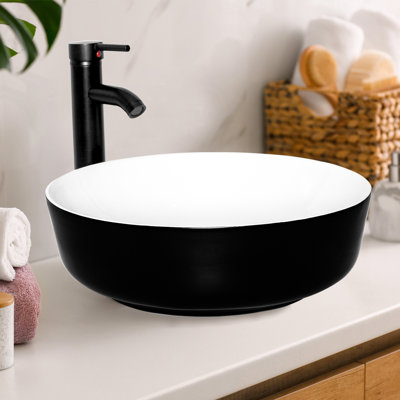 Lavabo de salle de bain vasque circulaire en céramique noire avec robinet