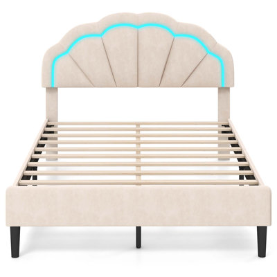 Lit plateforme tapissier en velours avec tête de lit