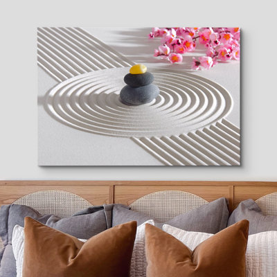 Photographie de salle de bain zen avec pierres de massage et pierres de massage