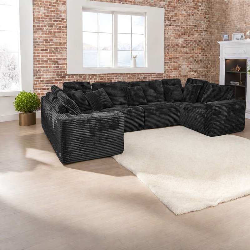 Canapé confortable modulaire en forme de U, velours côtelé noir, salon moderne et spacieux