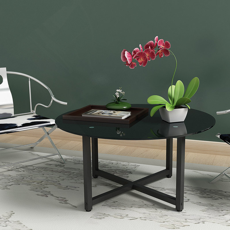 Table basse ronde avec plateau en verre