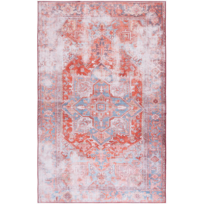 Tapis oriental rouille / bleu