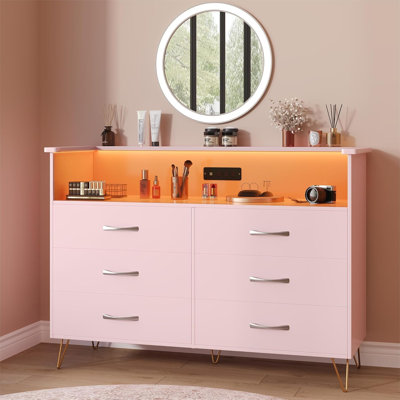 Commode à 6 tiroirs à bords surélevés en MDF, panneaux de particules et métal, avec bande lumineuse DEL et prise électrique, rose, idéale pour la chambre, le salon, l'entrée ou comme meuble de rangement pour vêtements.
