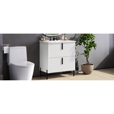 Meuble-lavabo de 30 po avec lavabo intégré en céramique, tiroir cannelé, fonction de fermeture en douceur, espace d'extension, poignée de doigt de 5,8 po, pieds de 8,27 po, blanc, conception d'inspiration américaine avec glissières encastrées,