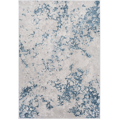 Tapis antibleu/ivoire abstract Adilynn