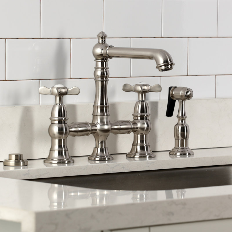 Kingston Brass Essex Two-Handle 4-Hole Deck Mount Bridge Kitchen Faucet with Brass Side Sprayer, Brushed Nickel