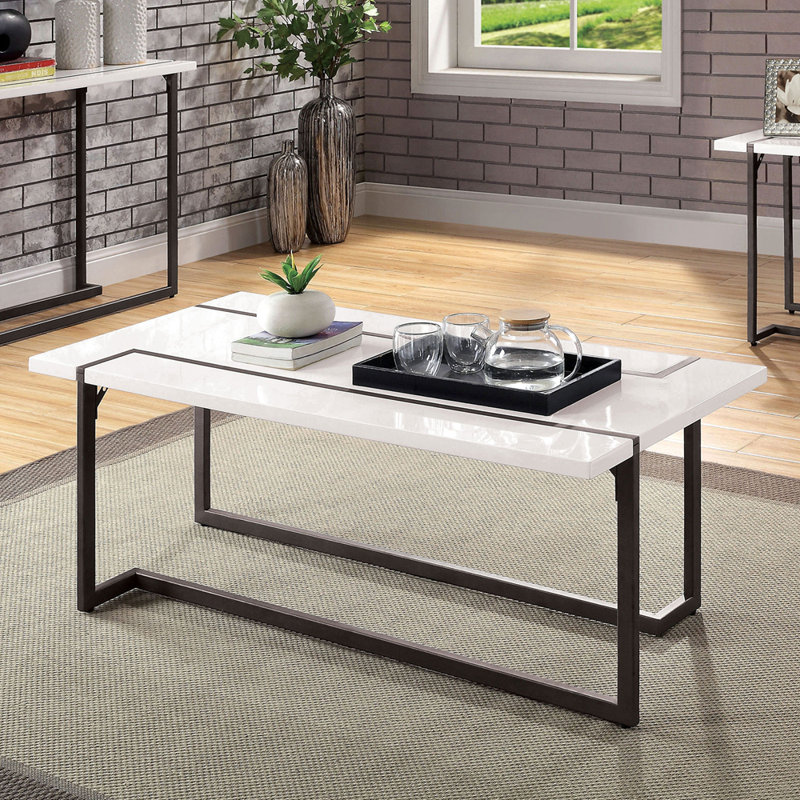 Pieds de table basse de style moderne et contemporain se prolongeant sur le plateau de la table.