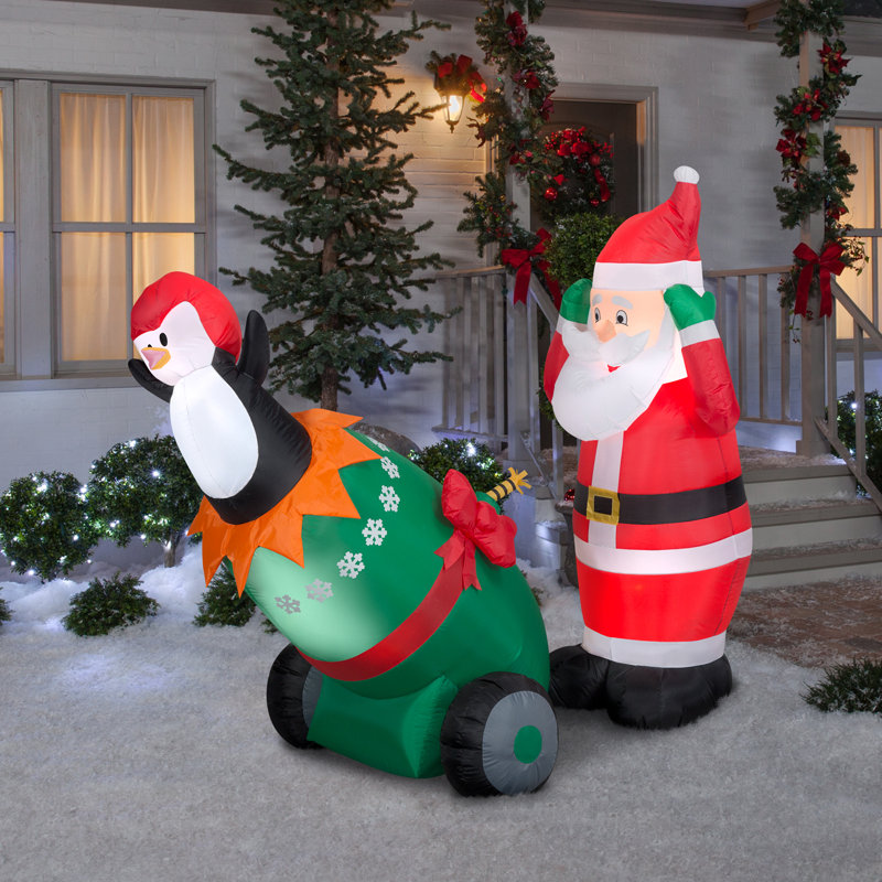 Décoration gonflable lumières Père Noël et pingouin