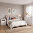 Ensemble de chambre moderne 3 pièces comprenant une commode à 7 tiroirs et 2 tables de chevet avec porte et étagère ouverte, blanc