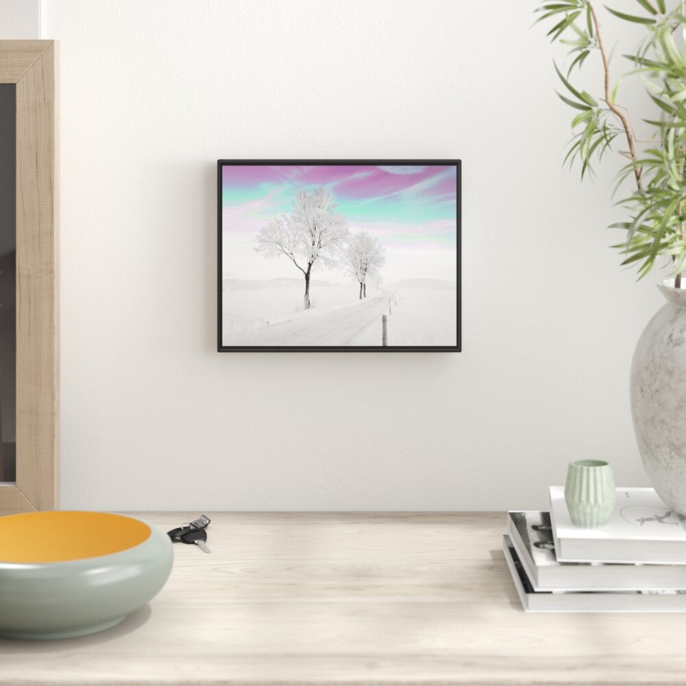 Gerahmtes Wandbild Baum in Winterlandschaft