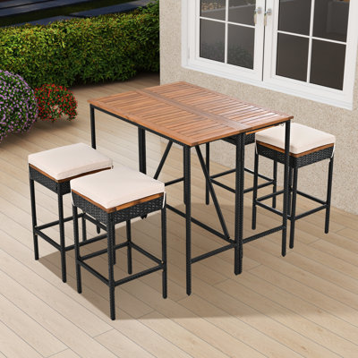 Hataway Patio Dining Set Rectangular Table with Cushions Included
