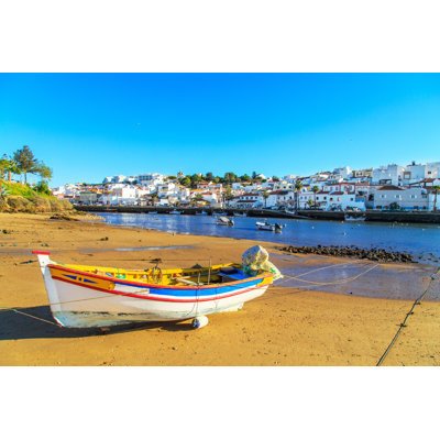 Boats In Sunset by Maniscule - Wrapped Canvas Print