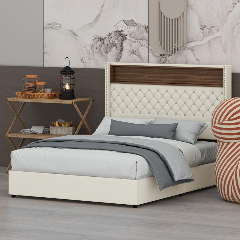 Soft Upholstered Bed Frame Featuring a Tall Wing-Back Headboard with Rivet Details, Built-in Shelving, USB Port, and Ambient Lighting