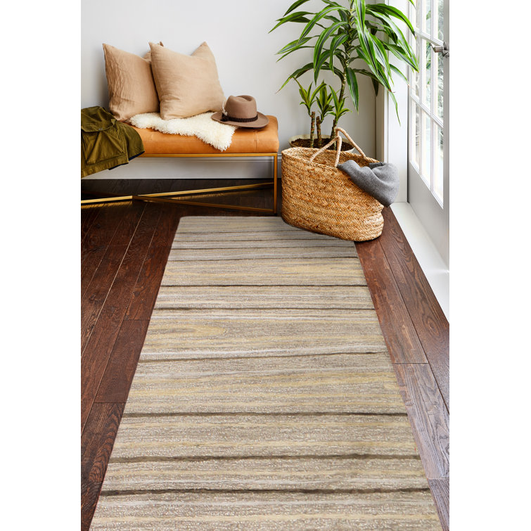 Kelson Handmade Tufted Tan Area Rug