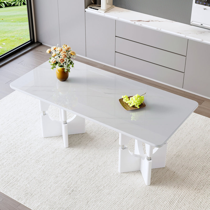 Table de salle à manger moderne en panneau de fibres à densité moyenne avec esthétique en marbre et structure creuse