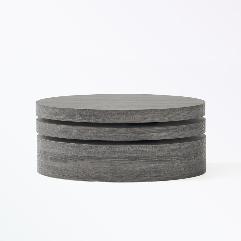 Rotating coffee table with sturdy base