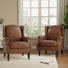 Fauteuil à oreilles en similicuir brun rembourré avec garniture cloutée Duward