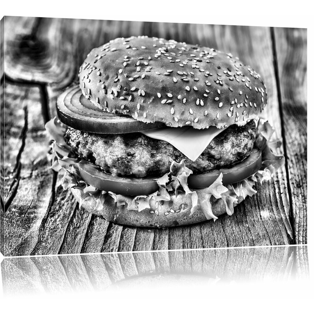 Leinwandbild Leckerer Cheeseburger in Monochrom