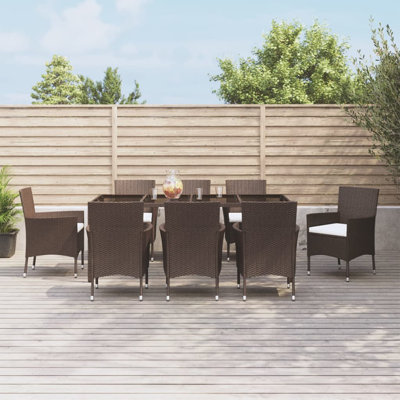 Dannicka 8 - Person Wicker Patio Dining Set with Rectangular Table , Cushions Included