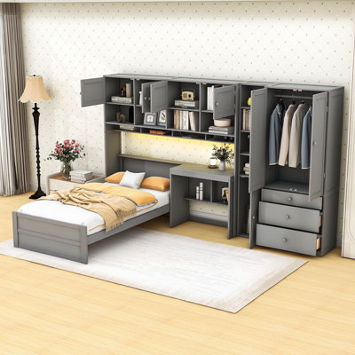 Lit plateforme simple en bois avec bureau à DEL, tiroirs, armoires et tablettes