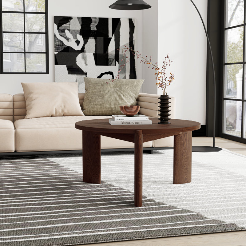 Modern Round Coffee Table with Three-Legged Design