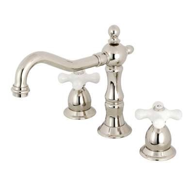Kingston Brass Heritage Two-Handle 3-Hole Deck Mount Widespread Bathroom Faucet with Brass Pop-Up Drain
