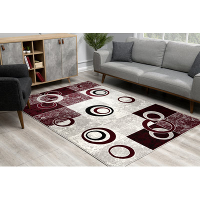 Tapis rose à motif géométrique Dillup-Jones