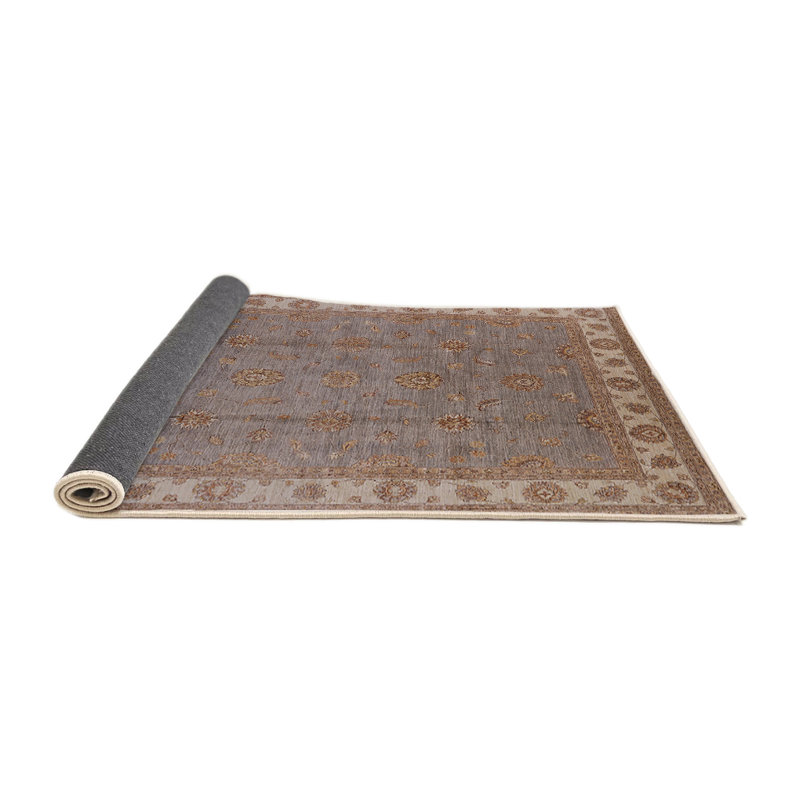 Tapis brun Cheesman, Rond 6 pi
