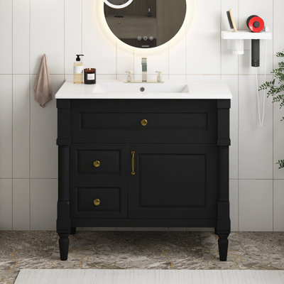 Meuble-lavabo autoportant avec lavabo, armoire de salle de bain avec lavabo en céramique, tiroir rabattable, tablette réglable, structure en bois d'hévéa et panneaux de fibres à densité moyenne, poignées en métal, finition peinte en noir