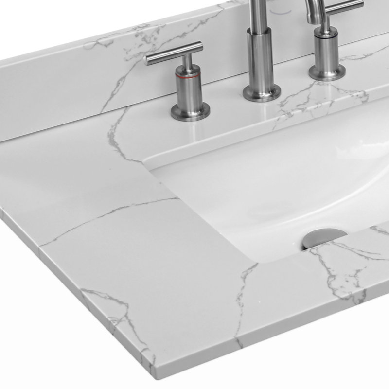Comptoir de salle de bain en pierre avec lavabo encastré en céramique et trou de robinet