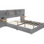 Grand lit plateforme tapissier en velours gris avec prises de courant et tablette de rangement