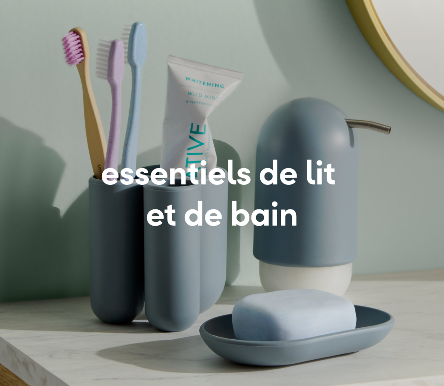 Bathroom essentials including towels, toiletry containers, and brushes neatly arranged.