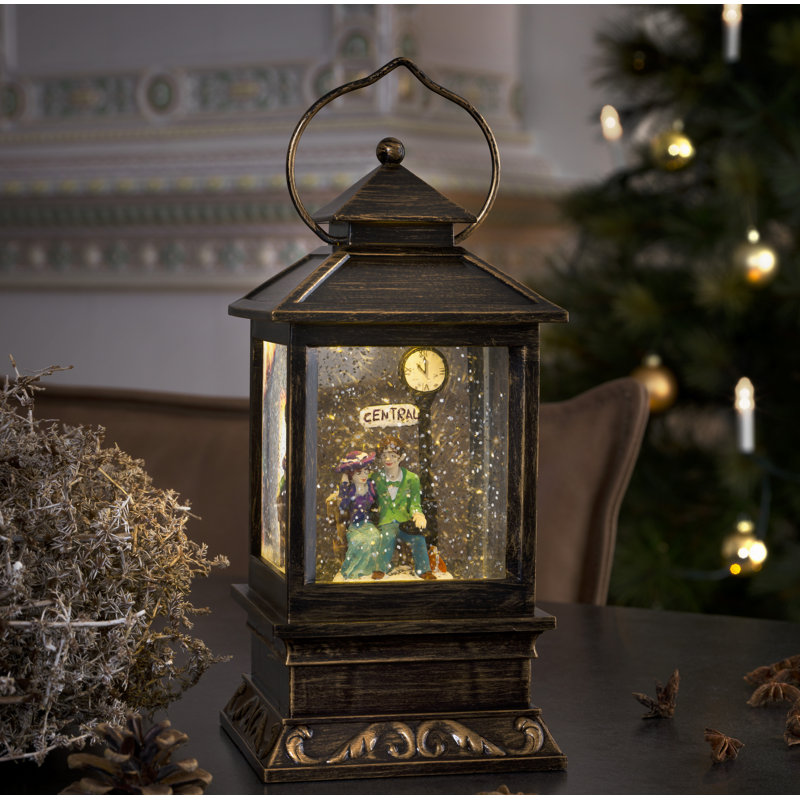 Snow Lantern with Seated Couple on a Bench