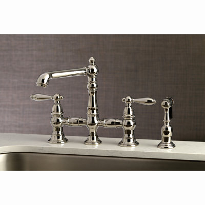 Kingston Brass English Country Two-Handle 4-Hole Deck Mount Bridge Kitchen Faucet with Brass Side Sprayer