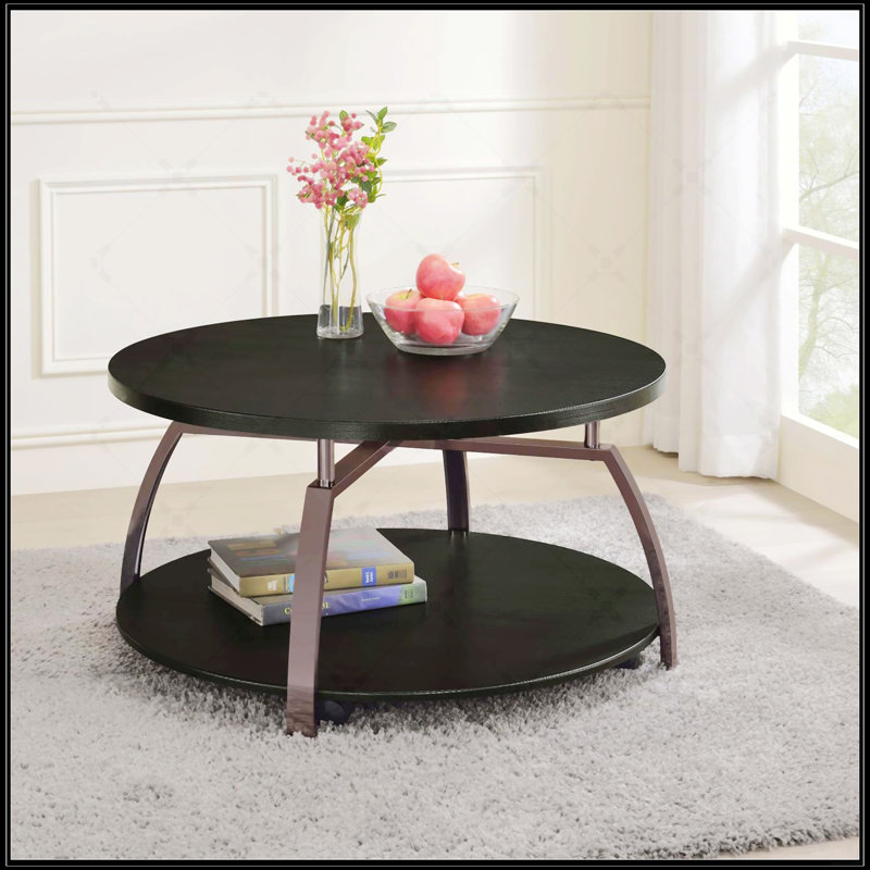 Table basse ronde gris foncé et nickel noir